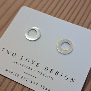 Sterling silver cut-out circle stud earrings - flat disc with circular hole by Two Love Design