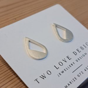 Sterling silver cut-out teardrop stud earrings - half-filled teardrop with triangular cutout by Two Love Design