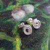 Sterling silver spiral stud earrings - hand-coiled matte geometric design by Two Love Design